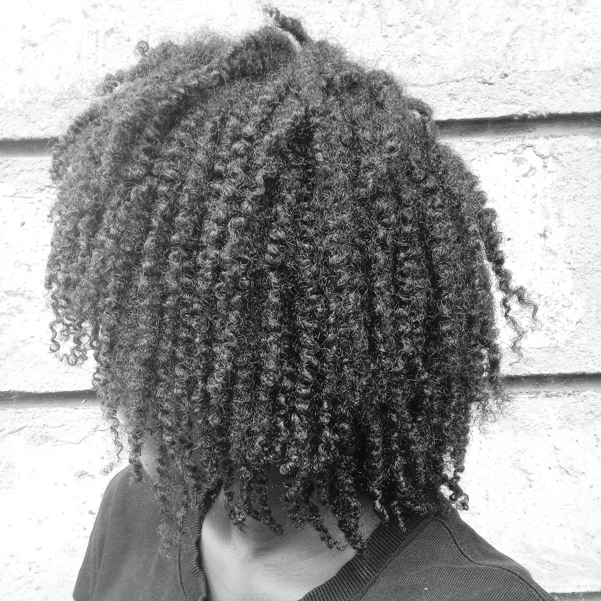 Using hair butters to define curls and coils